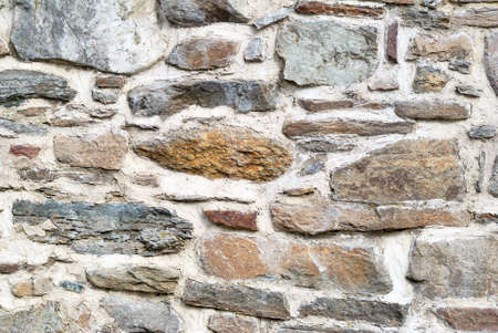 Stone house wall texture backgroundの写真素材