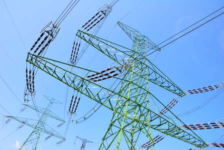 High voltage towers and electricity cablesの写真素材