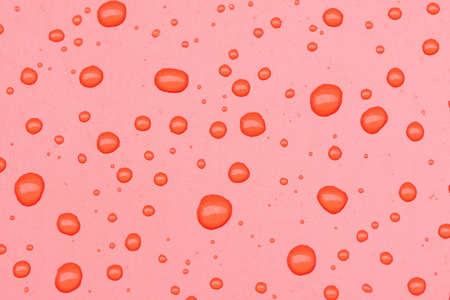 Abstract red background with rain dropsの写真素材