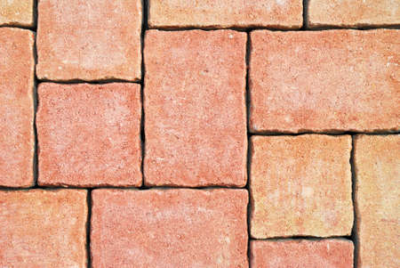 Abstract orange tiled paving texture background