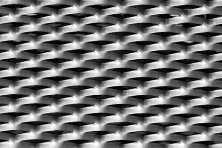 Metallic grater repeating texture background