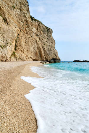 Porto Katsiki beach end with a white waveの写真素材