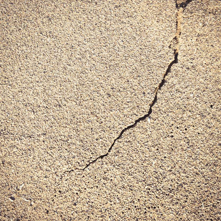 Flat and cracked sandy beach surface textureの写真素材