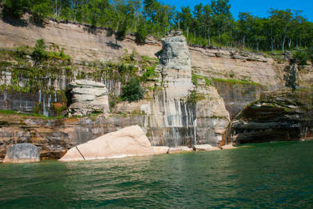 Painted rocks at Pictured Rocks National Lakeshore, Michigan, USAの写真素材
