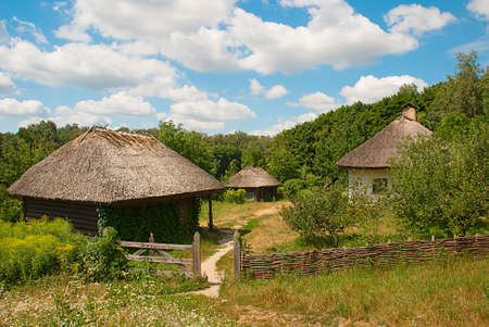 Old Ukrainian huts with thatched roofs, National Museum of Folk Architecture and Life of Ukraineのeditorial素材