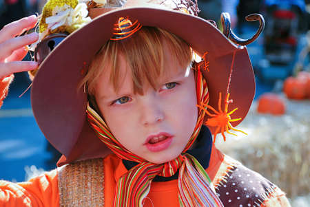 Portrait of a cute child in a fancy dress for halloweenの写真素材