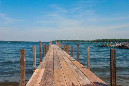 Pier on Lake Spirit at bright summer day, Arnolds Park, Iowa, USAの写真素材