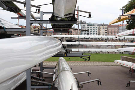 Sports canoes placed in the dock, ready for training.