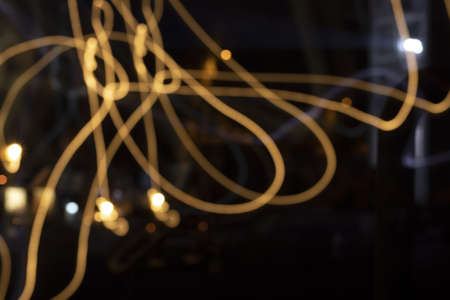 Night photo from car cinema with abstract blur lights.の写真素材
