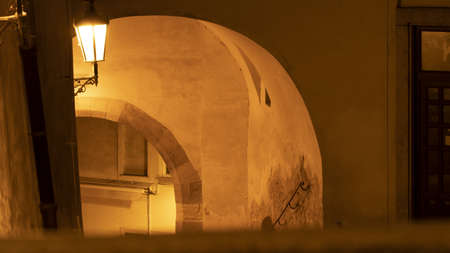 Night photo of an old lamp in the arcadeの写真素材