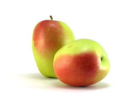 Some green-red fresh apples on white background の写真素材