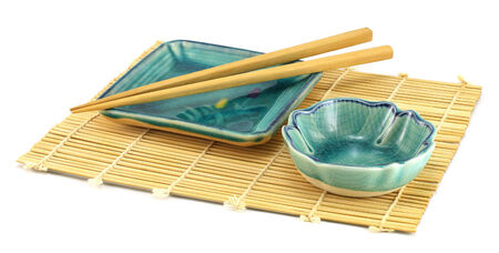 An empty sushi plates with chopsticks の写真素材
