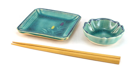 An empty sushi plates with chopsticksの写真素材