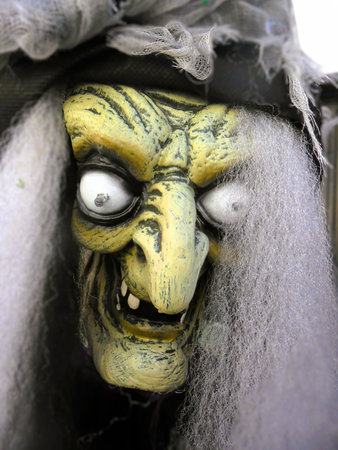 Zombie in the cemetery, closeup of photo with shallow depth of field