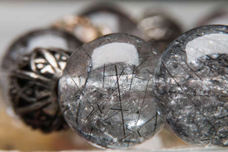 natural stone, quartz with rutile macro on blurred backgroundの写真素材