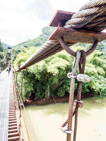 Rope bridge, the ways to across the river in some of the travel place or jungle , popular for extreme adventure travelの写真素材