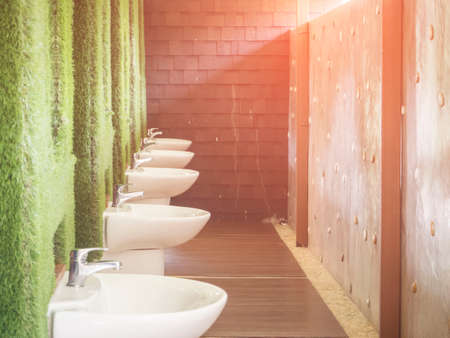 white basin on sunlightの写真素材