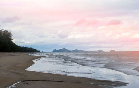 Beautiful beach and dramatic sunrise sky , vacationの写真素材