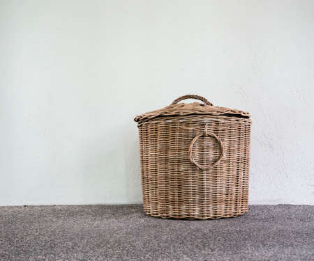 Rattan basket for storage of clothesの写真素材