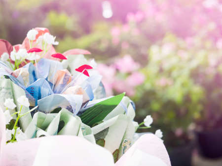Beautiful origami bouquet made from Thai Banknotesto congratulate graduatesの写真素材