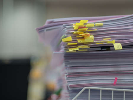 many jobs waiting to be done on the table, busy conceptの写真素材