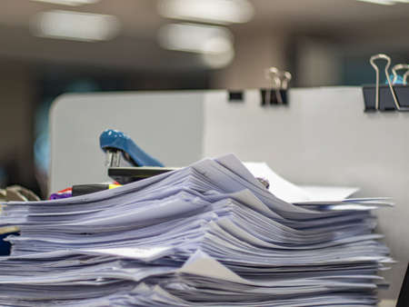 many jobs waiting to be done on the table, busy conceptの写真素材