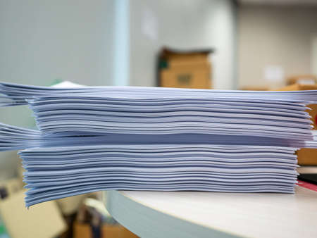 many jobs waiting to be done on the table, busy concept