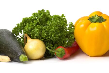 Peppers, parsley, onion and marrow isolated on whiteの写真素材