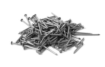 Heap of nails isolated on white backgroundの写真素材