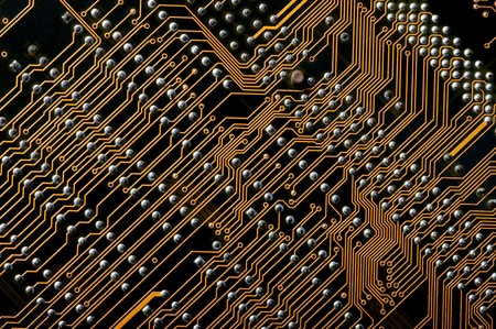 Dark digital circuit board background (pc motherboard)の写真素材