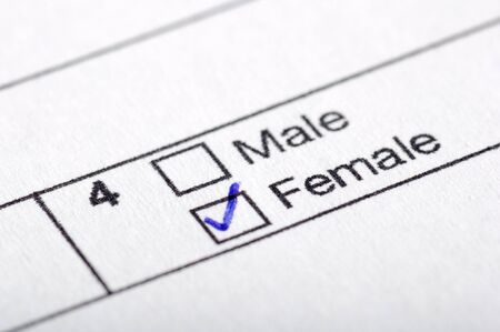 Check box for selection of sex on white paperの写真素材