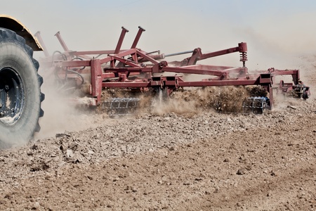 Harrowing a fieldの写真素材