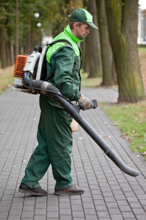 Landscaper operating gasoline Leaf Blowerの写真素材
