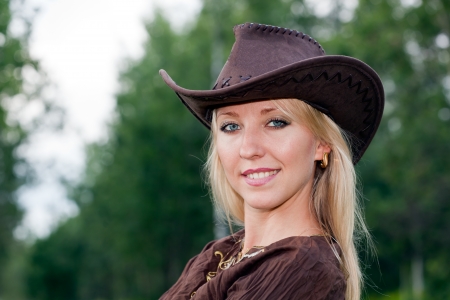 Pretty girl in a cowboy hatの写真素材