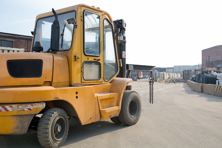 Forklift truck on factory road の写真素材