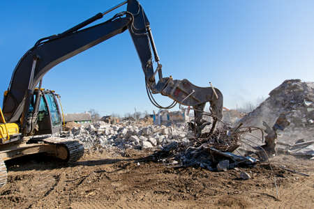 Crawler Demolition Excavator Pulverizer with Hydraulic Crusher Shearing Equipment for Scrap Steel Working at Construction Siteの写真素材