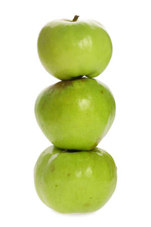 three green apples isolated on a white backgroundの写真素材