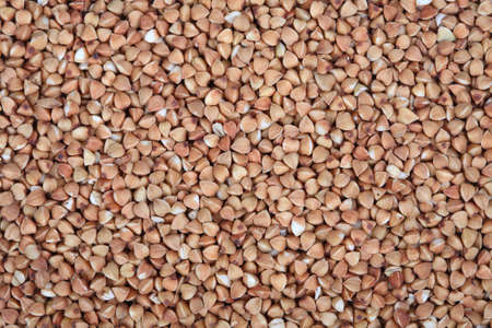 buckwheat seeds sprinkled evenly brown background texture