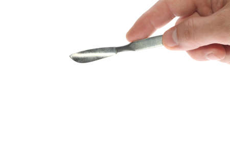 scalpel in his hand surgeon on white backgroundの写真素材