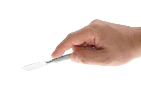 scalpel in his hand surgeon on white backgroundの写真素材