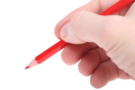 red pencil in hand isolated on white backgroundの写真素材