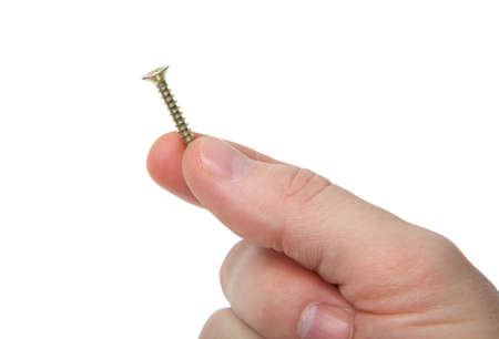 yellow metal screw isolated on a white background