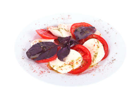 mozzarella cheese on a plate white backgroundの写真素材