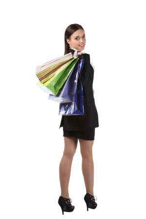 The girl with the office worker shopping in the beautiful bagsの写真素材