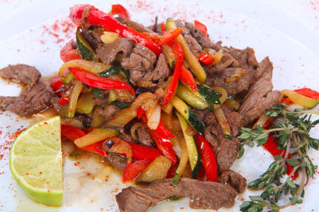 roasted beef steak on a white plateの写真素材