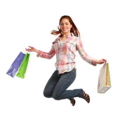 Woman with shopping bags on white isolated backgroundの写真素材