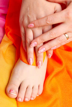 Women's hands with a nice manicureの写真素材