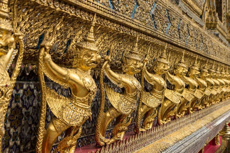 golden garudas around grand palaceの写真素材