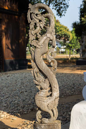 Woodern Naga crafted from teakwood の写真素材