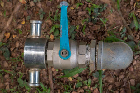 Big water valve in gardenの写真素材